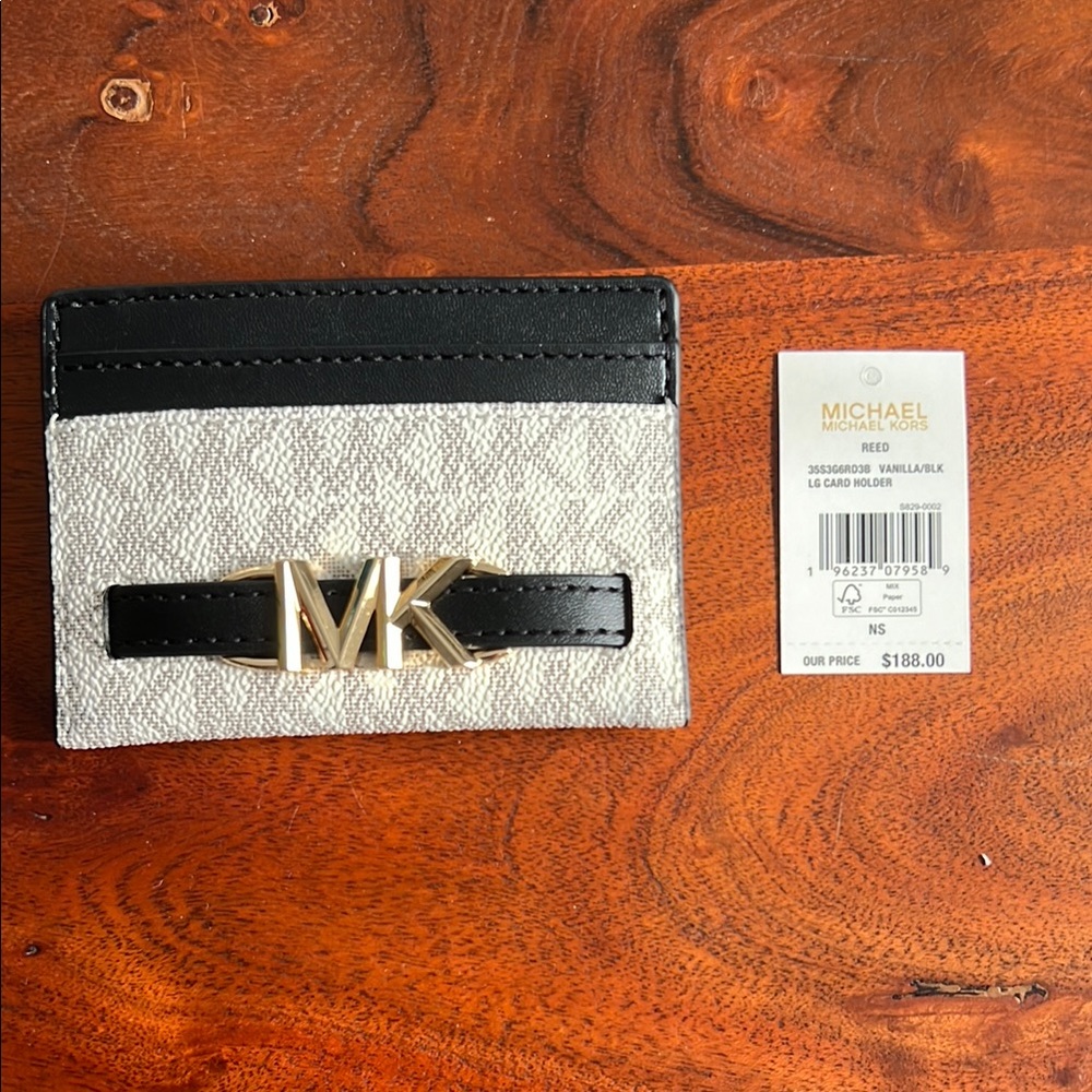 Michael Kors card holder/mini wallet.
